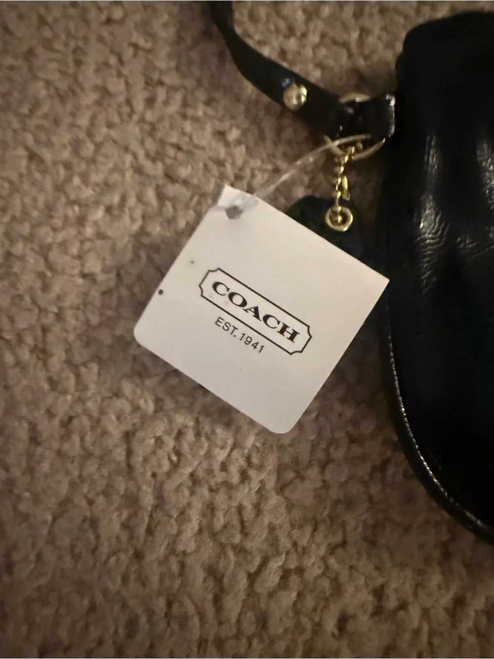 Coach Black Leather Wristlet with Gold Patch